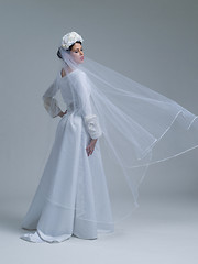 Image showing young bride in a wedding dress with a veil