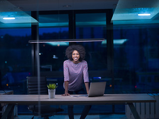 Image showing black businesswoman using a laptop in startup office