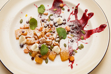 Image showing Tasty dessert from pumpkin and sea-buckthorn