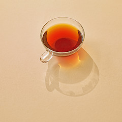 Image showing cup of tea with long shadow