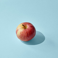 Image showing apple with long shadow