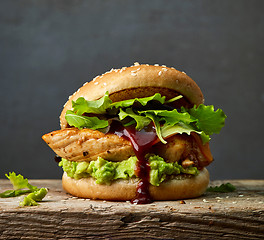 Image showing burger with chicken meat and avocado