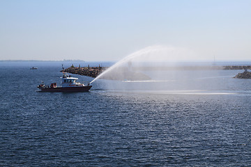 Image showing Fire Rescue Ship checking water guns 