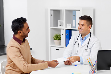 Image showing doctor and male patient meeting at clinic