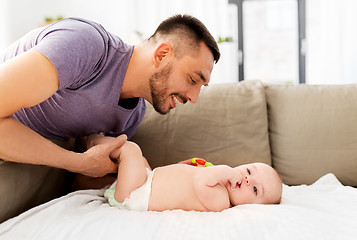 Image showing close up of father with little baby at home