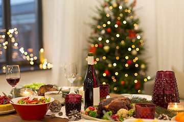 Image showing food and drinks on christmas table at home