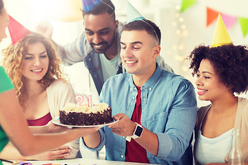 Image showing team greeting colleague at office birthday party