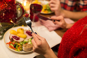 Image showing close up of woman having christmas dinner