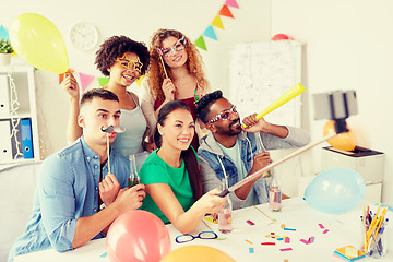 Image showing happy team taking selfie at office party