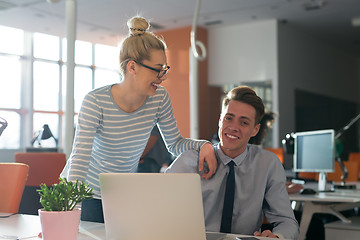 Image showing Two Business People Working With laptop in office