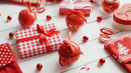 Image showing Baubles and beads near Christmas presents