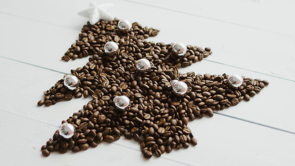 Image showing Coffee beans laid in shape of fir