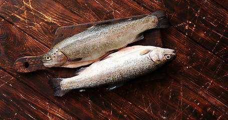 Image showing Fish placed on chopping board