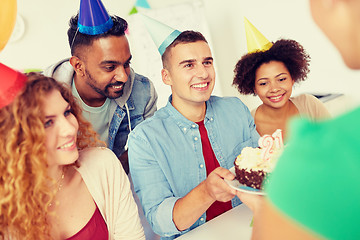 Image showing team greeting colleague at office birthday party