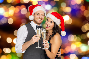 Image showing couple with champagne glasses at christmas party