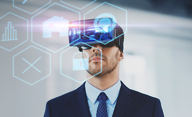 Image showing businessman with virtual reality headset at office