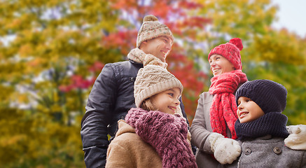 Image showing happy family over autumn park background