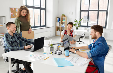 Image showing creative team working on user interface at office