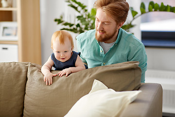 Image showing happy father with little baby daughter at home