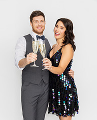 Image showing happy couple with champagne glasses at party