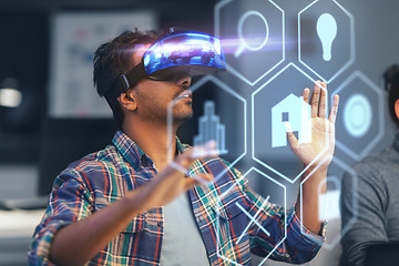 Image showing man in vr headset with virtual interface at office