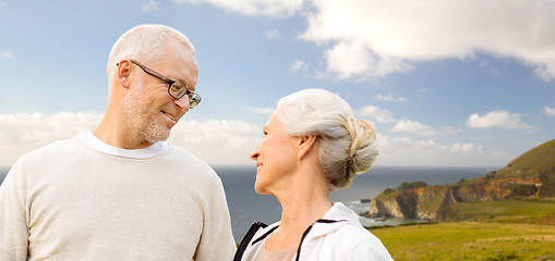 Image showing happy senior couple over big sur coast