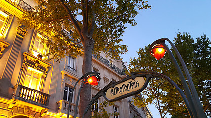 Image showing Famous sign of metro station in night Paris