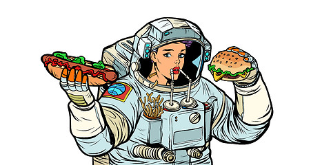 Image showing Woman astronaut eats. Cola, hot dog and Burger fast food. Isolat