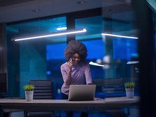 Image showing black businesswoman using a laptop in startup office