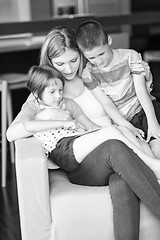 Image showing Young Family Using A Tablet To Make Future Plans