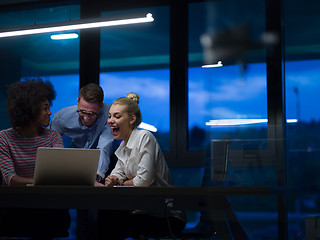 Image showing Multiethnic startup business team in night office