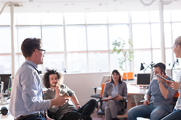 Image showing Young Business Team At A Meeting at modern office building