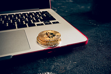 Image showing The golden bitcoin on keyboard