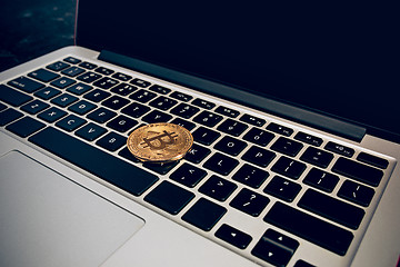 Image showing The golden bitcoin on keyboard