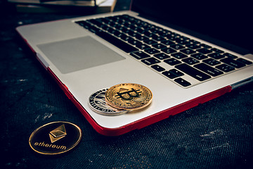 Image showing The golden bitcoin on keyboard