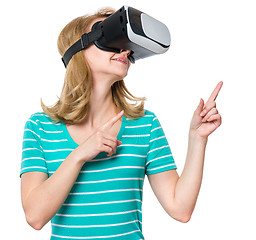 Image showing Woman looking in VR glasses