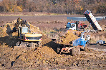 Image showing Excavator digging soil