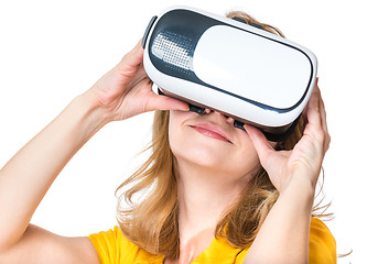 Image showing Woman looking in VR glasses