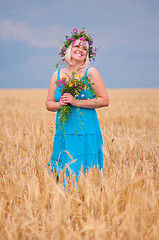 Image showing Woman at wheat meadow