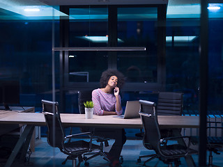 Image showing black businesswoman using a laptop in startup office