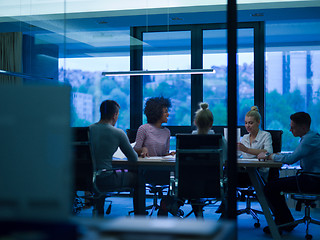 Image showing multiethnic Group of young business people throwing documents