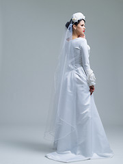 Image showing young bride in a wedding dress with a veil