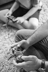 Image showing Happy family playing a video game