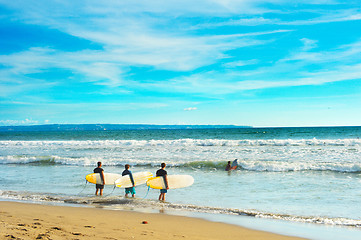 Image showing Surfers going to surf