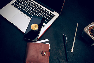 Image showing The golden bitcoin on keyboard