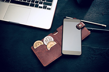 Image showing The golden bitcoin, phone, keyboard