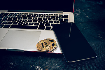 Image showing The golden bitcoin on keyboard