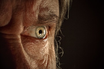 Image showing Close-up view on the eye of senior man.