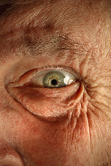 Image showing Close-up view on the eye of senior man.