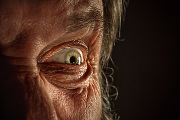 Image showing Close-up view on the eye of senior man.